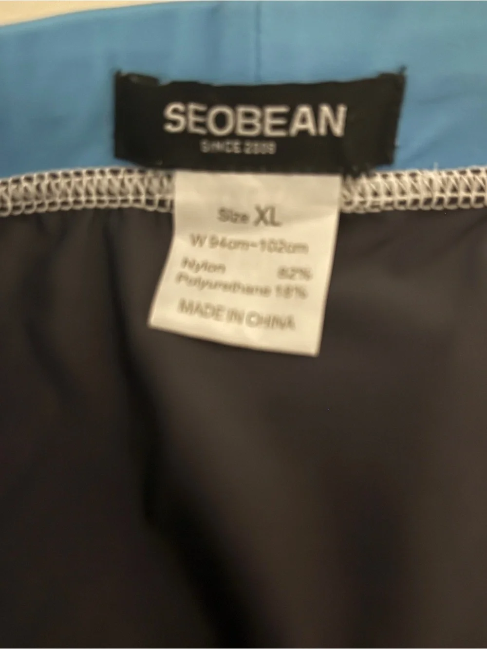 SOEBEAN Men’s Blue & Black Swim Brief with White Trim